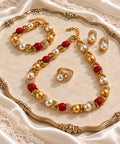 Rouge Élégance jewelry set close flat lay